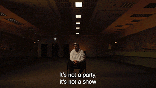 a man sitting in a chair with the words it 's not a party it 's not a show