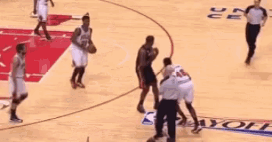 a basketball game is being played on a court with a chicago bulls jersey on