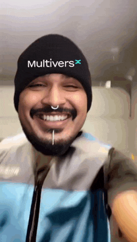 a man wearing a beanie that says multivers