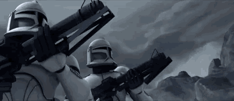 a group of clone trooper soldiers holding guns in a storm .