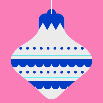 a blue and white christmas ornament is hanging on a pink background