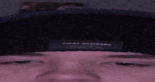 a close up of a person 's face with a label that says ' american eagle ' on it