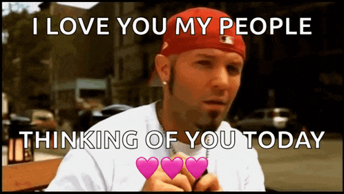 a man in a red hat says i love you my people