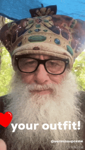 a man with a beard wearing glasses and a crown says " your outfit "
