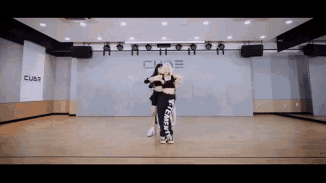 a dance studio with a sign that says cube