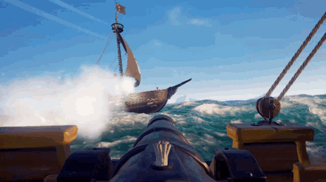 a pirate ship with a flag on top of it is in the ocean
