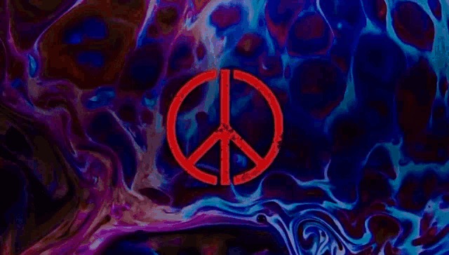 a red peace sign is on a purple and blue marbled background .