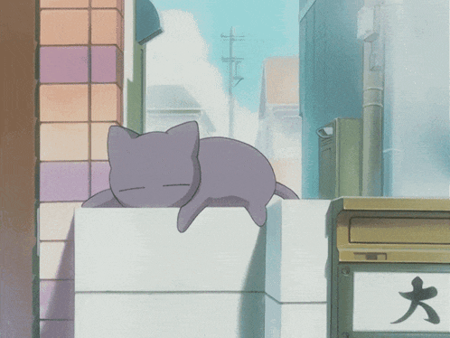 a purple cat is laying on a brick wall next to a mailbox with chinese characters on it