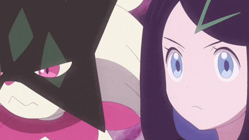 a girl with blue eyes is standing next to a cartoon character