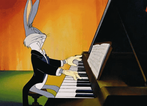 bugs bunny playing a piano in a cartoon