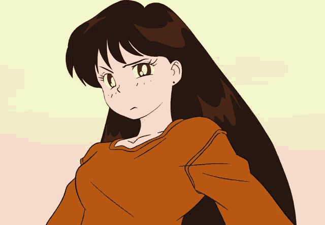 a girl with long brown hair is wearing a brown sweater