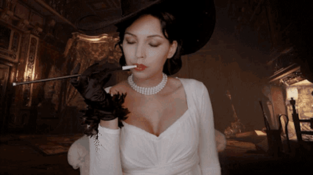 a woman in a white dress and black gloves smoking a cigarette