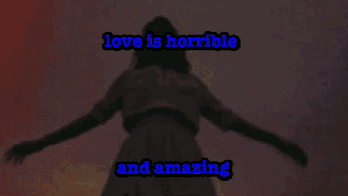 a woman is standing in a field with the words love is horrible and amazing