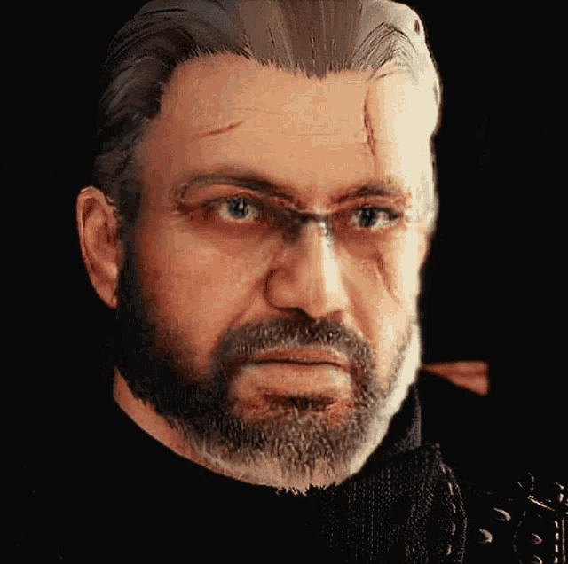 a close up of a man 's face with a beard and glasses