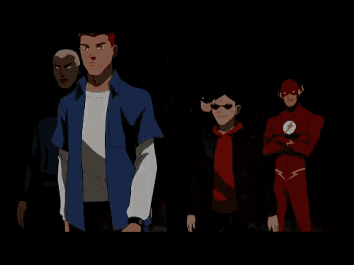 a group of young justice characters are standing together in the dark