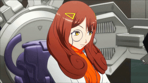 a girl with red hair has a triangle on her hair clip