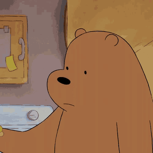 a cartoon bear is crying with tears coming out of his eyes