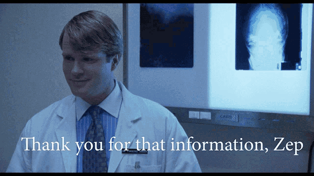 a man in a lab coat stands in front of a screen that says thank you for that information zep