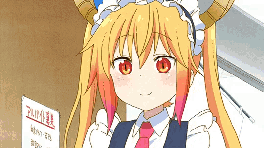 a girl in a maid outfit is standing next to a sign that says ' a ' on it
