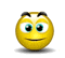 a yellow smiley face with blue eyes and a surprised look on its face .