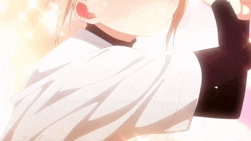 a girl with blonde hair and purple eyes is smiling with her mouth open
