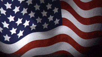 a close up of an american flag with white stars on it