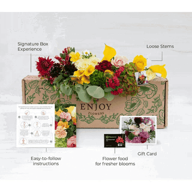 a box of flowers with the words enjoy flowers on the front