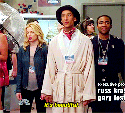 a group of people are standing in a room with a caption that says it 's beautiful