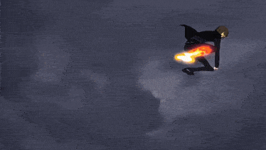a man in a suit is flying through the air with a rocket coming out of his feet