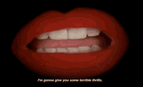 a close up of a woman 's mouth with the words i 'm gonna give you some terrible thrills below it