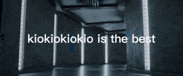 a man is hanging from the ceiling with the words kiokikokiko is the best