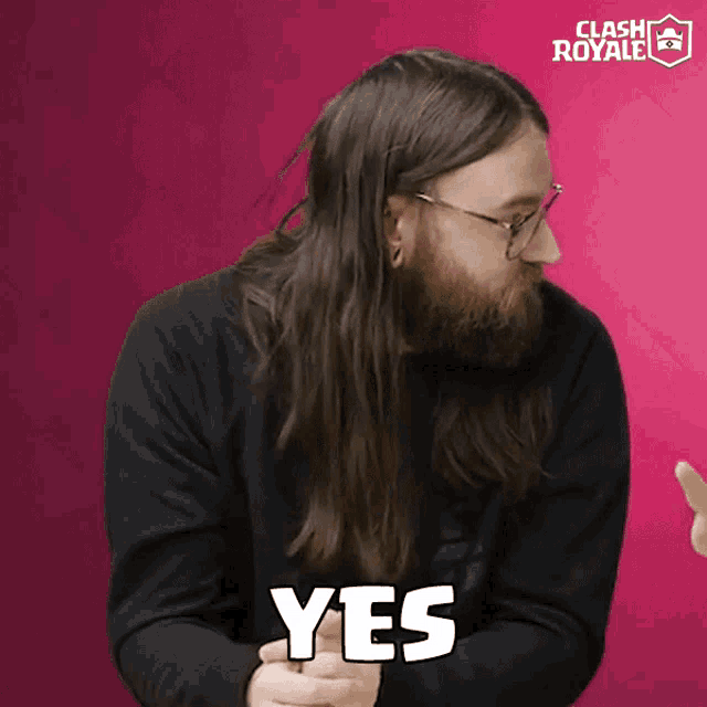 a man with glasses and long hair says yes
