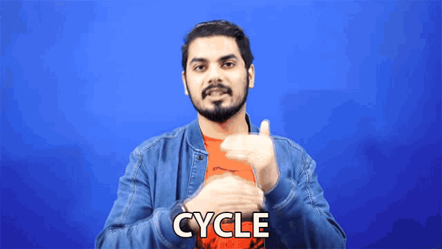 a man in a blue jacket says the word cycle