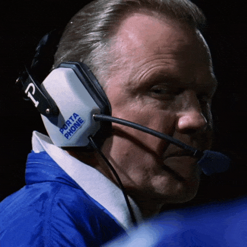 a man wearing headphones that say porta phone on them