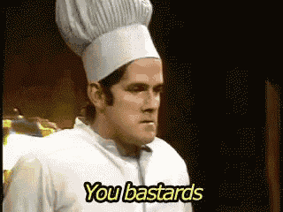 a man wearing a chef 's hat says you bastards