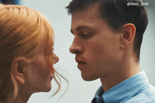 a man and a woman are looking into each other 's eyes with the hashtag men_in4k above them