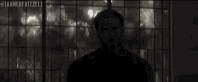 a close up of captain america 's face with the words captain america below him
