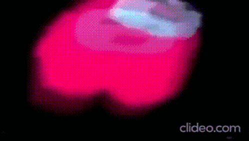 a close up of a red among us character 's face on a black background