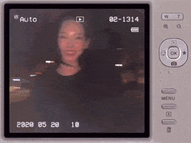a video of a woman is being recorded on a camera with the date of 2020 05 20 18