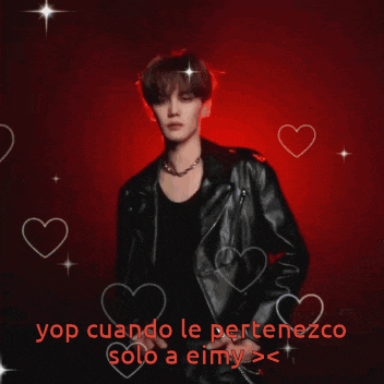 a man in a black leather jacket is surrounded by hearts