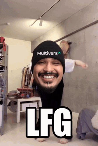 a man with a beard wearing a multivers hat