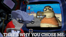 a cartoon character says that 's why you chose me in front of a television screen