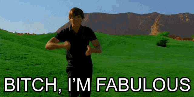 a man is running in a field with the words bitch i 'm fabulous