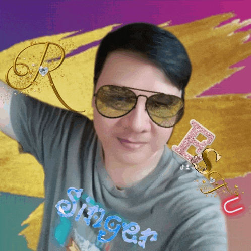 a man wearing sunglasses and a t-shirt that says singer