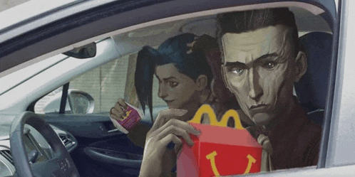 a man and a woman are sitting in a car eating mcdonald 's happy meals .