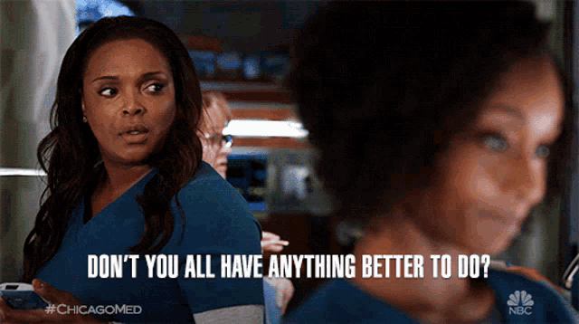 a woman says " don t you all have anything better to do " while holding a cell phone