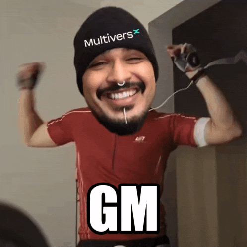 a man wearing a beanie that says multivers flexes his muscles