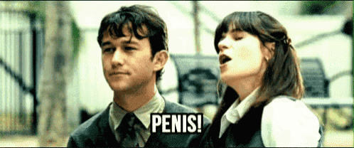 a man and a woman are standing next to each other and the woman is shouting penis .