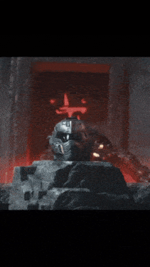 a man in armor is holding a helmet that says doom on it