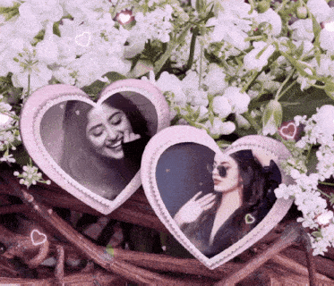 two heart shaped picture frames with two women on them are surrounded by white flowers
